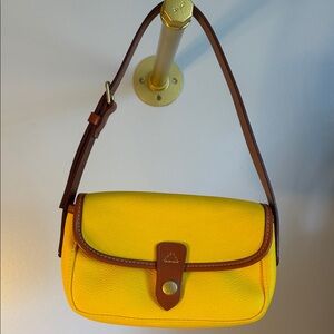 Dooney & Bourke yellow pebble leather, btn trim Red inside ,key fob shoulder bag